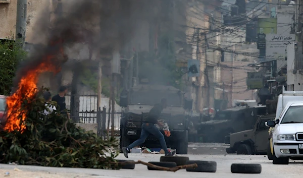 Israeli forces raiding the Balata refugee camp in Nablus on Saturday 13 May 2023 (AFP)