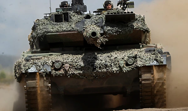 A Germany army Main battle tank Leopard 2A6 takes part in the Lithuanian-German military exercise 'Griffin Storm 2023' at a training range in Pabrade, Lithuania, June 26, 2023 (AP)