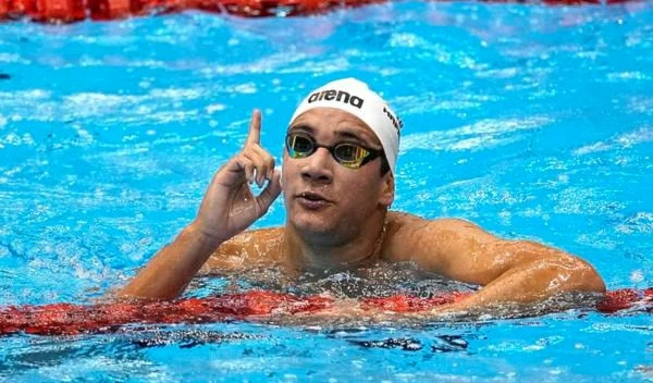 Ahmed Hafnaoui of Tunisia celebrates after winning the men's 1500m freestyle final at the World Swimming Championships in Fukuoka, Japan, on Sunday, July 30, 2023. AP