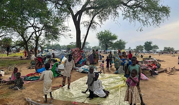 Sudanese refugees who fled the conflict in Sudan gather on July 10, 2023, at the Zabout refugee Camp in Chad. (AP)