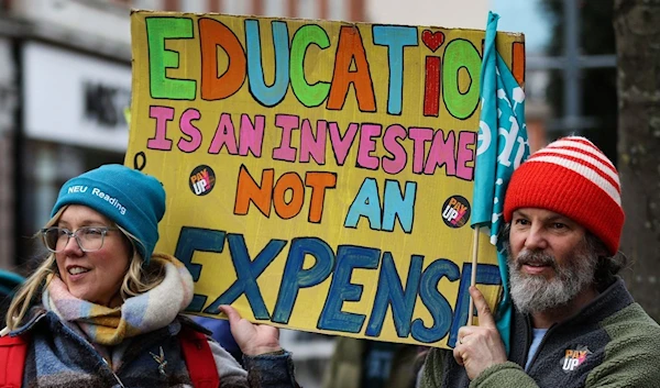 Teachers and members of the National Education Union take part in a demonstration in Reading, Britain, on Feb. 1, 2023 (AFP)