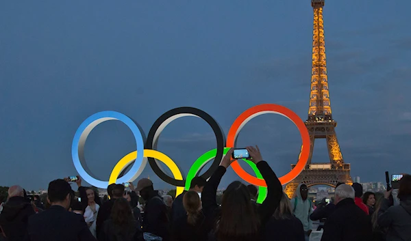 The Olympic rings are set up on Trocadero plaza that overlooks the Eiffel Tower, a day after the official announcement that the 2024 Summer Olympic Games will be in the French capital, in Paris, France, Thursday, Sept. 14, 2017. (AP)