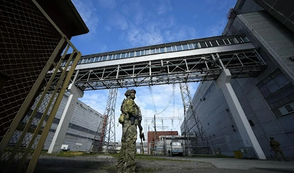 A Russian serviceman guards an area of the Zaparozhye Nuclear Power Plant (ZNPP) on May 1, 2022. (AP)