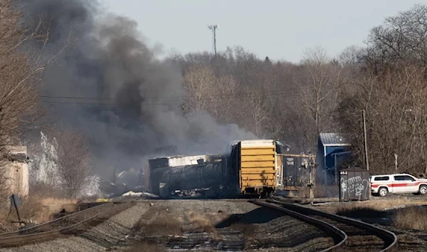 Smoke rises from a derailed cargo train in East Palestine, Ohio, on February 4, 2023. (AFP via Getty Images)