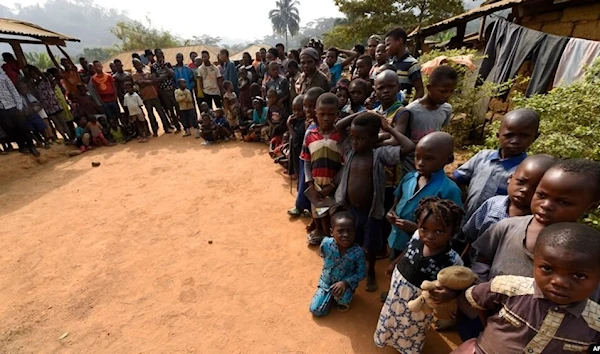 Cameroonians, including women and children, refugees from the Cameroon's restive anglophone regions, gather for a meeting at Bashu-Okpambe village, in Boki district of Cross Rivers State in Nigeria, Jan. 31, 2018. (AFP)