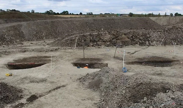 The pits, found in Houghton Regis, Bedfordshire, are up to 5m (16ft) wide and 1.85m (6ft) deep. (Mola)