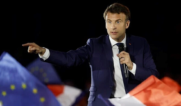 Current French President and centrist presidential candidate for reelection Emmanuel Macron delivers a speech during a campaign rally in Strasbourg, eastern France, April 12, 2022 (AP)