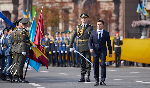 Ukrainian President Volodymyr Zelensky walks during the Independence Day military parade in Kyiv, Ukraine, Aug. 24, 2021. (Ukrainian Presidential Press Service/AFP)