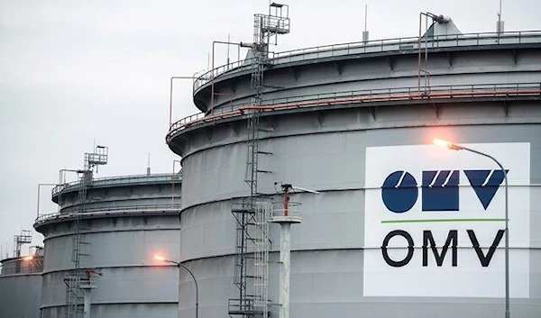 The logo of Austrian oil and gas group OMV is pictured on an oil tank at the refinery in Schwechat, Austria, October 21, 2015 (Bloomberg)