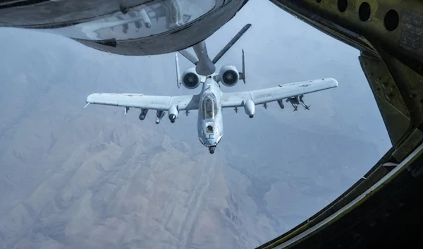 In this handout photo from the US Air Force, a US Air-Force 10 Thunderbolt II receives fuel from a KC-135 Stratotanker near the Strait of Hormuz. (AP)