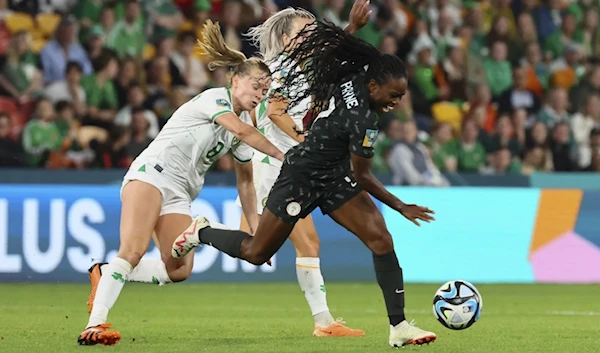 Ireland's Ruesha Littlejohn, left, battle for the ball with Nigeria's Antionette Payne during the Women's World Cup Group B soccer match between Ireland and Nigeria. (AP)