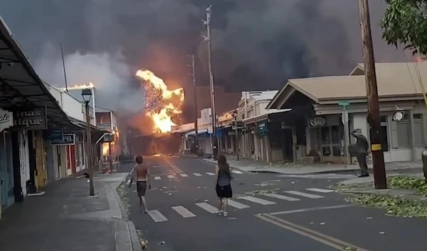 Smoke and flames fill the air from raging wildfires on Front Street in downtown Lahaina, Maui on August 8, 2023. (AP)