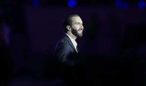 Salvadoran President Nayib Bukele's photo during the Central American and Carribean Games ceremony in San Salvadore, El Salvador's Gonzalez stadium, on June 23, 2023. (AP)