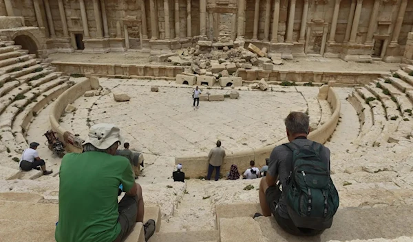 Tourists visit Roman ruins in Palmyra, Syria, on May 11, 2023. (AP)