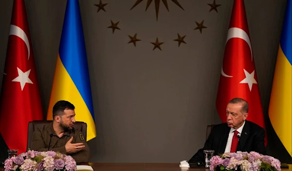 Ukraine's President Volodymyr Zelenskyy, left, talks to journalists next to Turkey's President Recep Tayyip Erdogan during a joint news conference following their meeting in Istanbul, Turkey. (AP)