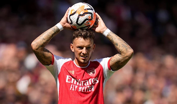 Arsenals Ben White holds the ball during the English Premier League soccer match between Arsenal and Nottingham Forest at Emirates stadium in London, Saturday, Aug. 12, 2023. (AP)