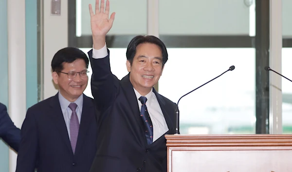 Taiwanese Vice President William Lai waves to the media as he departs for Paraguay at Taoyuan International Airport in Taoyuan, Taiwan, August 12, 2023 (AP)