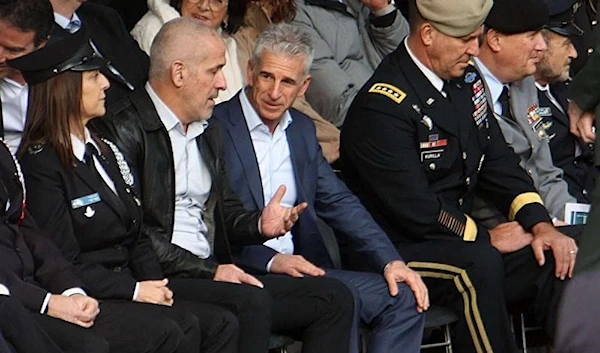 Israel’s Mossad chief David Barnea (C) attends an honour guard ceremony in Tel Aviv, January 16, 2023. (AFP)