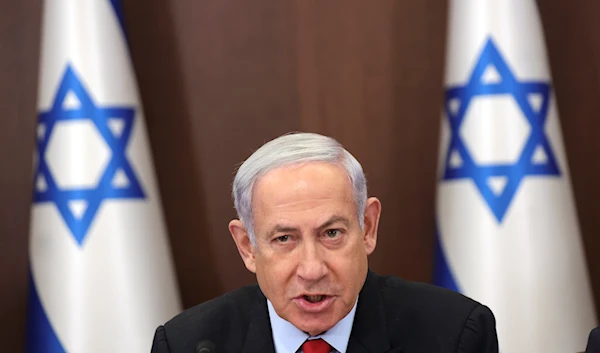 Israeli Prime Minister Benjamin Netanyahu attends the weekly cabinet meeting at the prime minister's office in occupied Al-Quds, occupied Palestine, July 30, 2023 (AP)