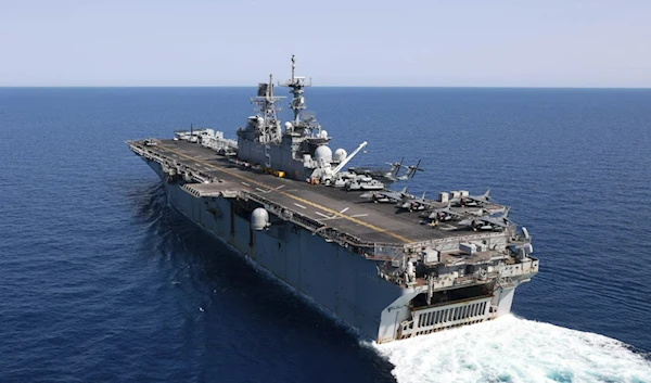 In this photo released by the US Navy, the amphibious assault ship USS Bataan travels through the Red Sea, August 8, 2023. (AP)