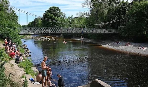 While the river Wharfe in Ilkley was England’s first bathing river, UK's official swimming rivers are too polluted to swim in. (AFP)