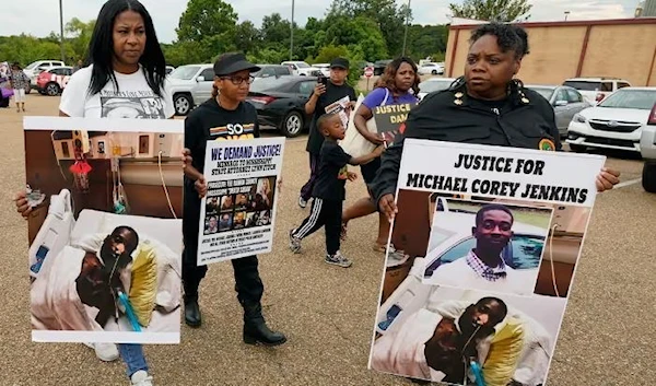 Local organizations and anti-police brutality activists march towards the Rankin county sheriff's office in Brandon, Mississippi on 5 July 2023. (AP)