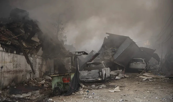 Destroyed cars and debris are scattered after the powerful explosion that hit San Cristobal, Dominican Republic on August 14, 2023. (AP)