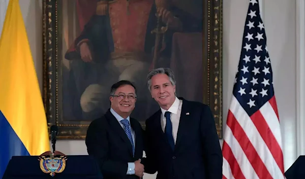 Colombian President Gustavo Petro (L) greets US Secretary of State Antony Blinken in Bogota, Colombia in October 2022 (AFP)