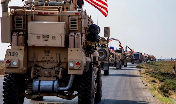 A US military convoy drives near the town of Qamishli, north Syria, Saturday, Oct. 26. 2019. (AP)