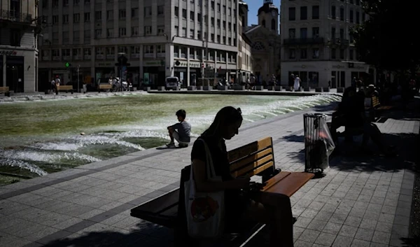 Many French people have been keeping to the shade as high temperatures weigh on the country. (AFP)