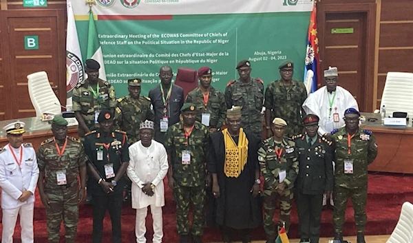 The defense chiefs from the Economic Community of West African States (ECOWAS) countries excluding Mali, Burkina Faso, Chad, Guinea and Niger pose for a group photo during their extraordinary meeting in Nigeria on August 4, 2023 (AP)