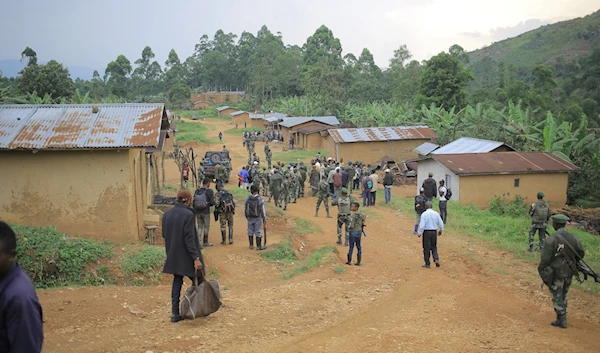 Democratic Republic of Congo Defense Forces gather in the North Kivu province village of Mukondi, March 9, 2023 (AP)