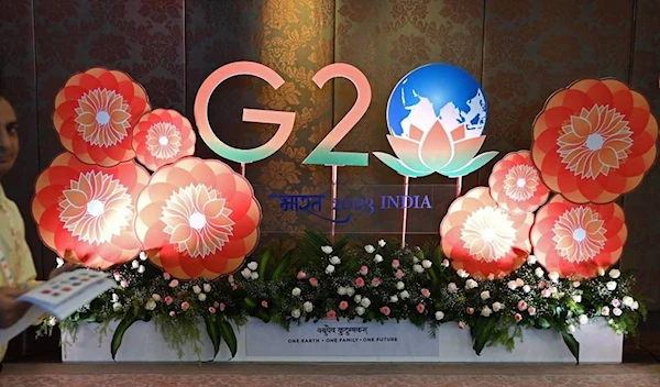 =A man walks through the venue of G20 environment and climate sustainability working group meeting in Chennai on July 27, 2023 (AFP)