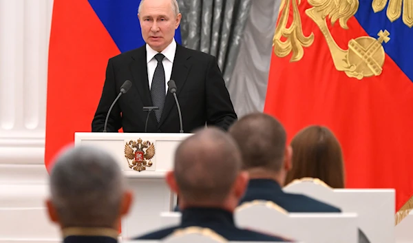 Russian President Vladimir Putin delivers a speech at the Kremlin's St. Catherine Hall in Moscow, Russia, Wednesday, Aug. 2, 2023