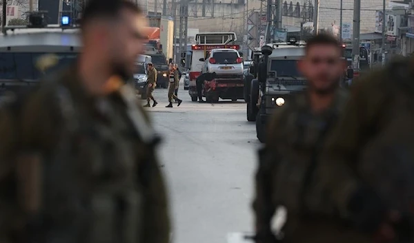 IOF soldiers after an attack in Huwara February 26 2023 (AFP)