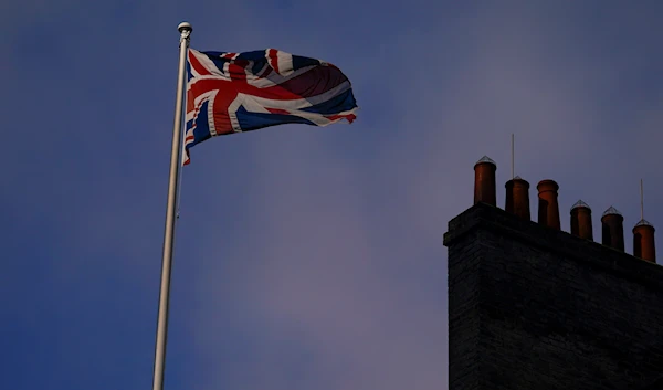 The Union flag flies atop 10 Downing Street, in London, Friday, February 4, 2022 (AP)