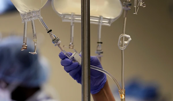 Fluids are controlled in an operating room in a hospital in Jackson, Tennessee, on June 15, 2023 (AP)