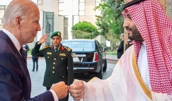 President Joe Biden fist-pumping with Saudi Arabia's Crown Prince Mohammed bin Salman. July 15, 2022 (Royal court of Saudi Arabia)