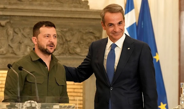 Ukraine's President Volodymyr Zelensky, and Greece's Prime Minister Kyriakos Mitsotakis pose after their statements at Maximos Mansion in Athens, Greece, Monday, Aug. 21, 2023. (AP)