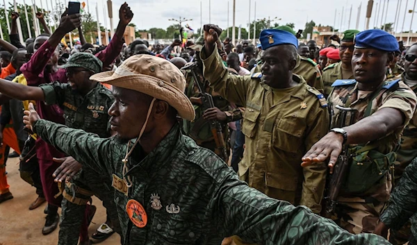 Members of Niger's military junta is greeted by pro-coup supporters in Niamey, Niger, August 6, 2023. (AFP)