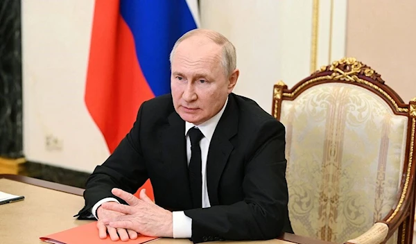 Vladimir Putin chairs a Security Council meeting via a video conference at the Kremlin in Moscow on Aug. 4, 2023. (AFP via Getty Images)