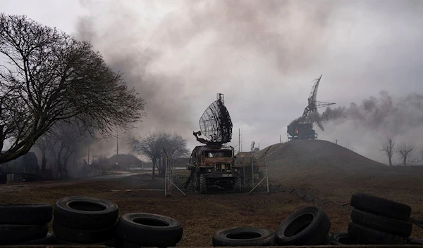 Smoke rise from an air defence base in the aftermath of an apparent Russian strike in Mariupol, Ukraine, Thursday, Feb. 24, 2022. (AP)