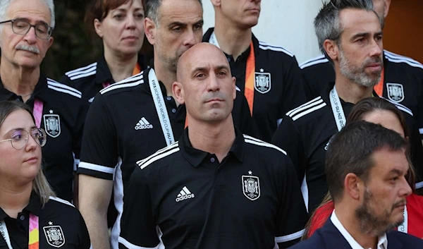 Spanish Football chief Luis Rubiales watches players arrive to greet their Prime Minister in Madrid on August 23, 2023 (AFP)