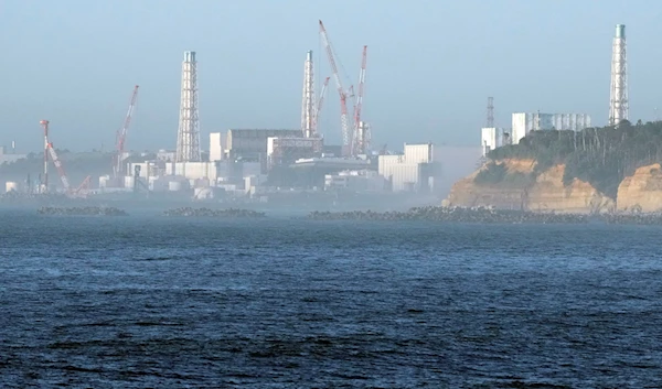 The Fukushima Daiichi nuclear power plant is seen from a nearby fishing port in Namie town, northeastern Japan, Thursday, Aug. 24, 2023 (AP)