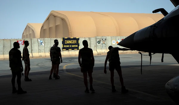 French Barkhane Air Force mechanics Niamey, Niger base, on June 5, 2021 (AP)