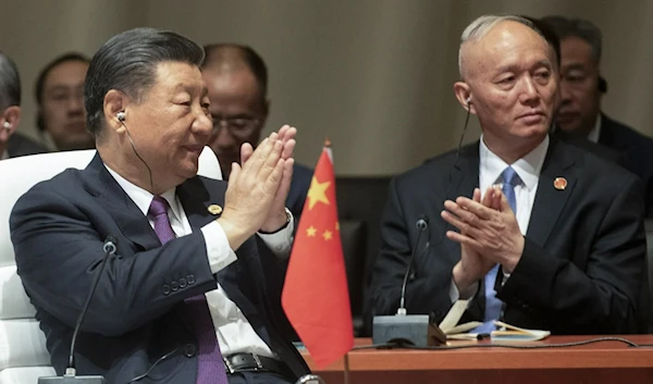 China's President Xi Jinping claps during the BRICS summit in Johannesburg, South Africa, Wednesday, August 23, 2023. (AP)