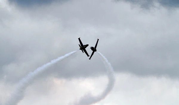 L-39 Albatros jets of the Breitling Jet Team, perform at an aerobatic show at Faliro coast in Athens, Greece, October 15, 2011 (AP)