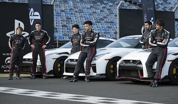 This image released by Sonic Pictures shows Mariano Gonzalez, from left, Darren Barnet, Maximilian Mundt, Archie Madekwe, Harki Bhambra and Pepe Baroso in a scene from 'Gran Turismo'. (AP)