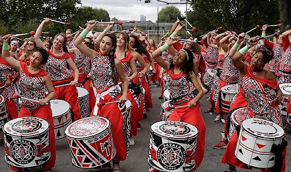 A band practices ahead of the parade during the Notting Hill Carnival in London, Monday, Aug. 27, 2018 (AP)