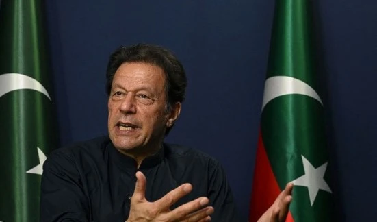 Former Pakistan's Prime Minister Imran Khan gestures as he speaks during an interview with AFP at his residence in Lahore on May 18, 2023. (AFP)